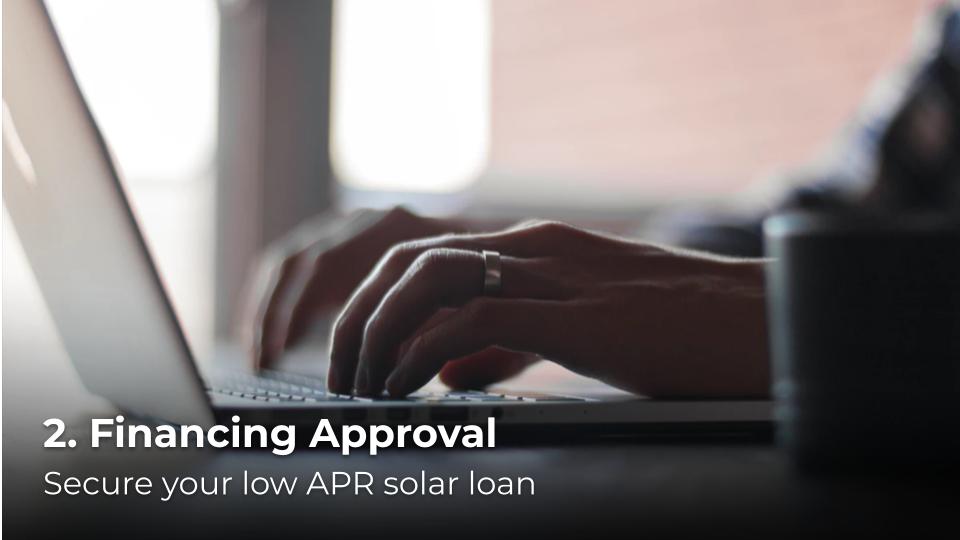 man typing on laptop keyboard getting approved for solar